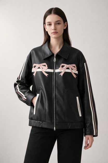 Black zip jacket with bow details and striped sleeves
