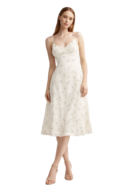 Light yellow midi dress with floral print and thin straps