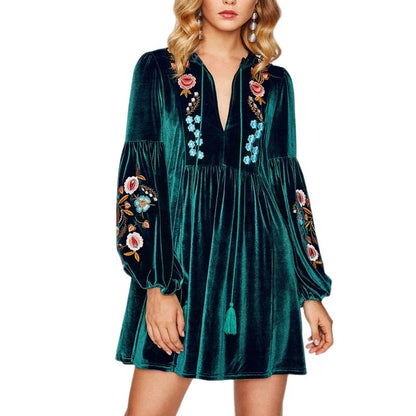 Dark green embroidered long sleeve mini dress with tassel detail