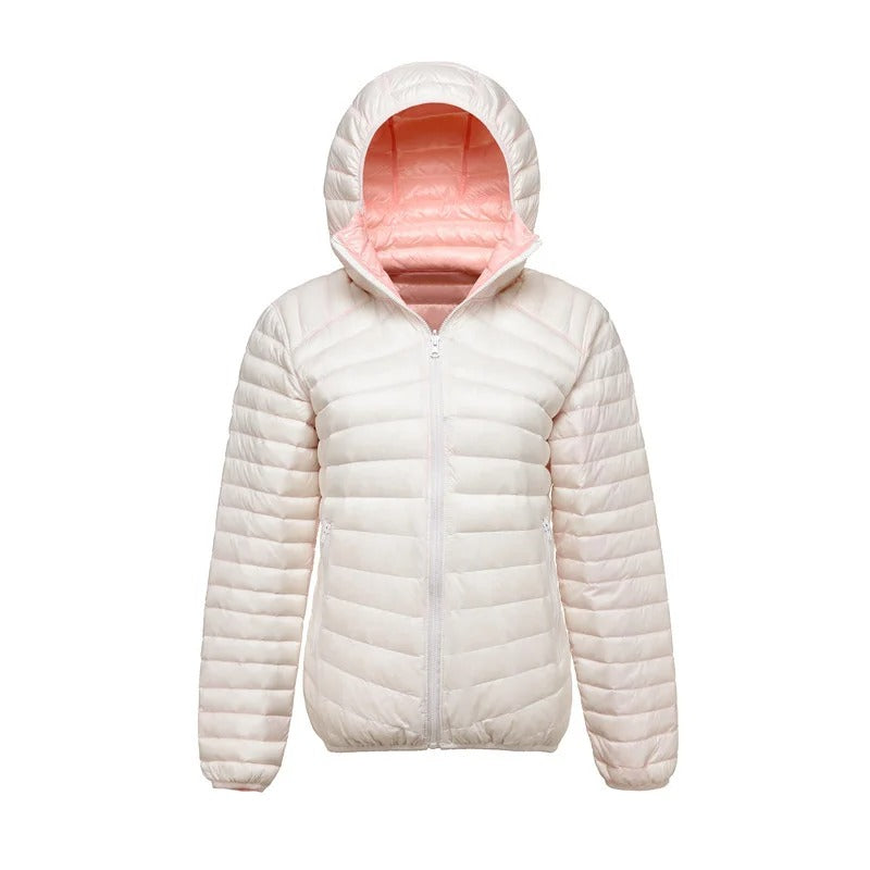 Reversible quilted jacket in pink and off-white with hood