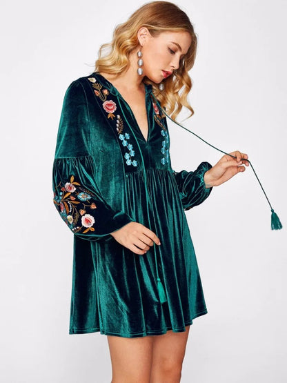 Dark green embroidered long sleeve mini dress with tassel detail