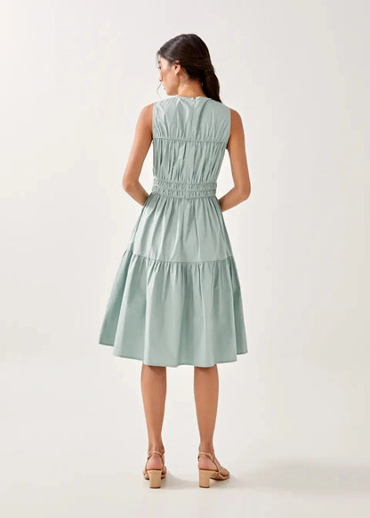 Light green sleeveless midi dress with smocked waist