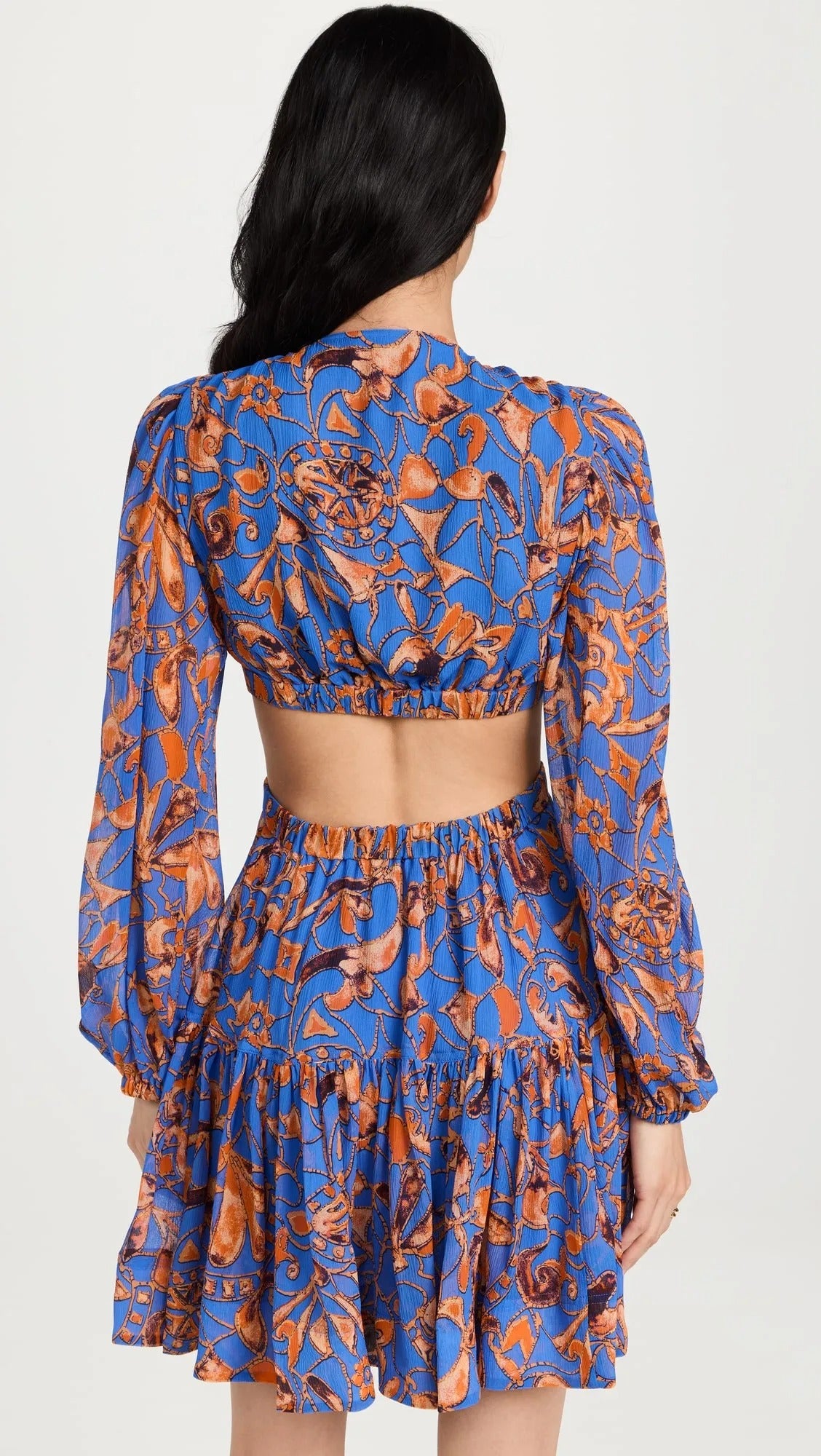 Blue patterned cut-out mini dress with long sleeves