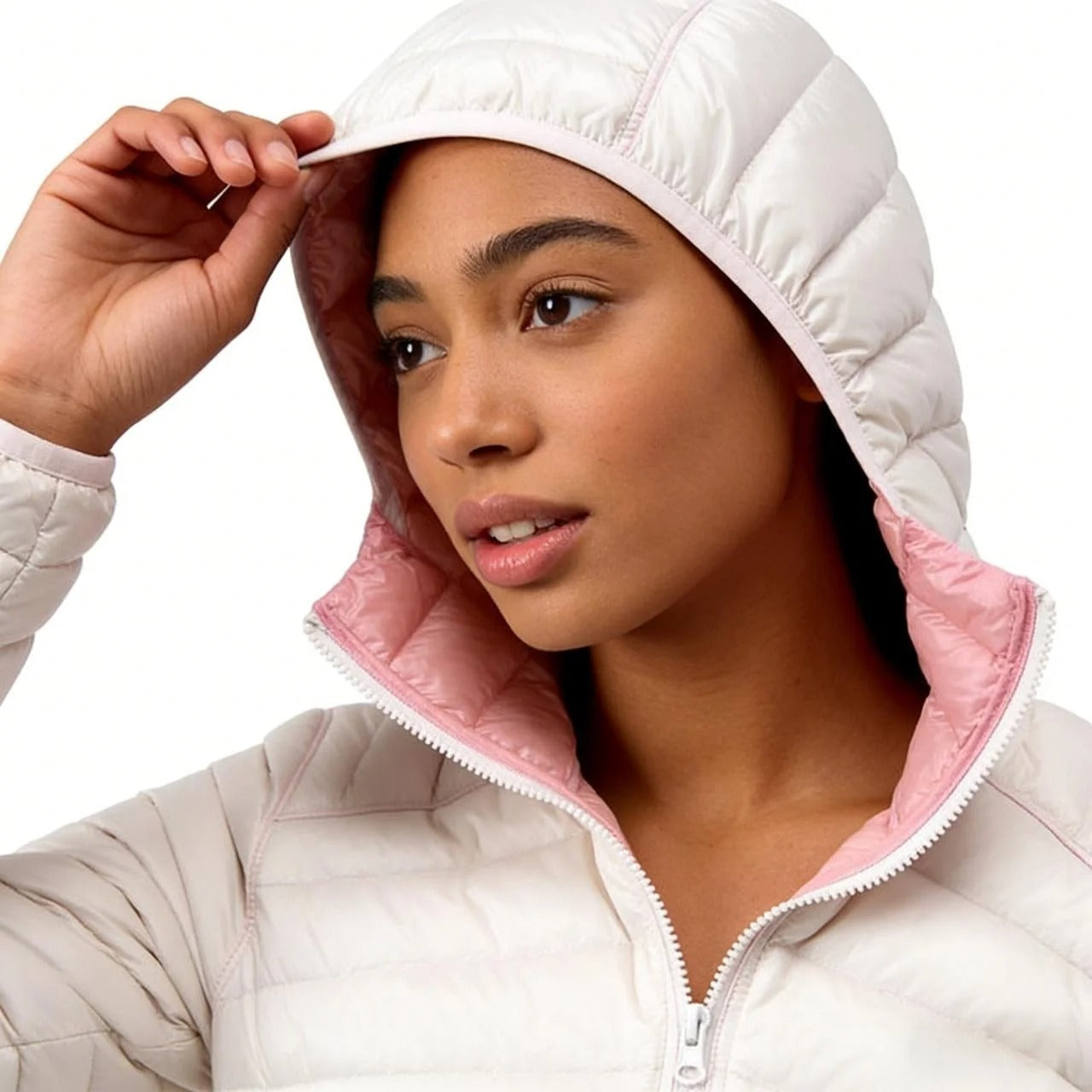 Reversible quilted jacket in pink and off-white with hood