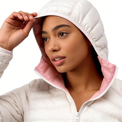 Reversible quilted jacket in pink and off-white with hood